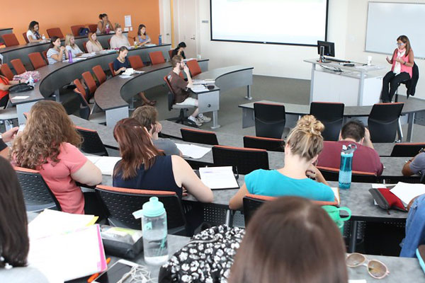 Lecture classroom with students learning
